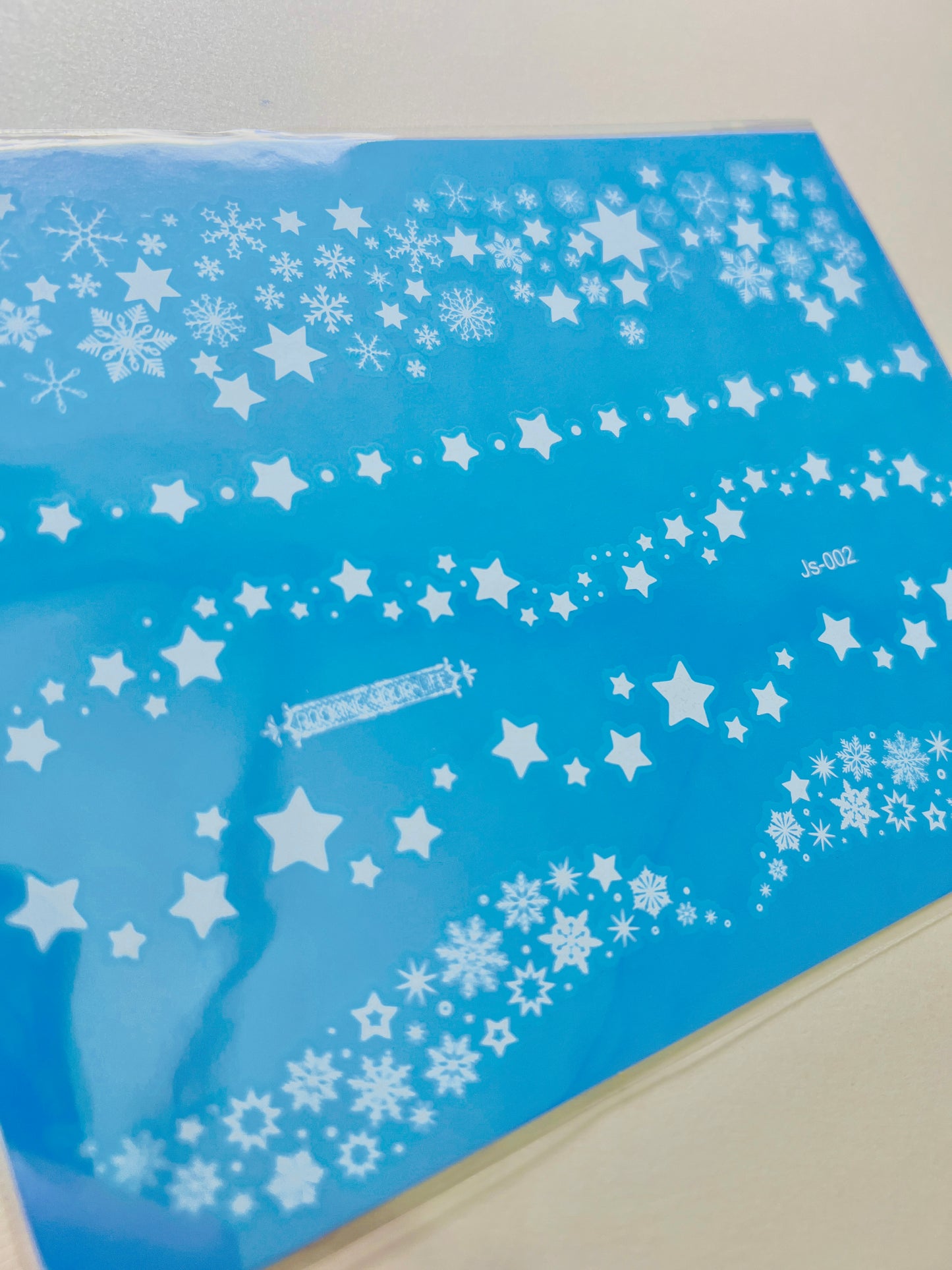 Estrellas en Tinta Blanca