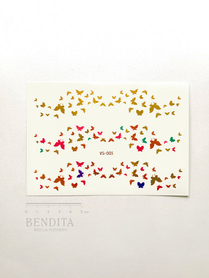Mariposas doradas y de colores